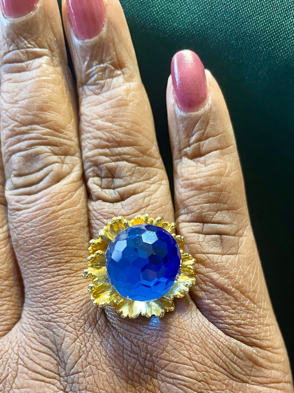 Gold Tone Cocktail Floral Ring with Large Faceted Royal Blue Stone. Size 6